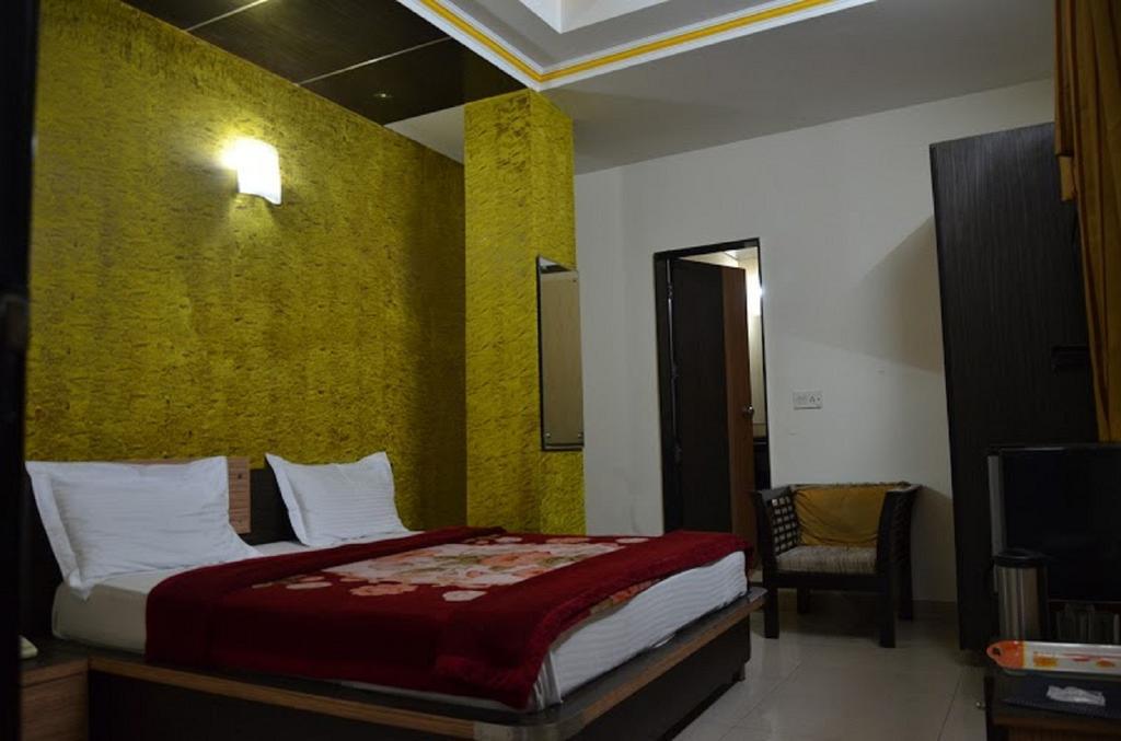 Hotel Durga International Nova Deli Quarto foto